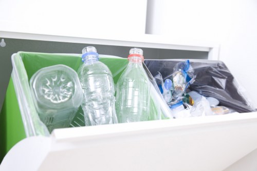 Employees participating in a recycling program at a South London company